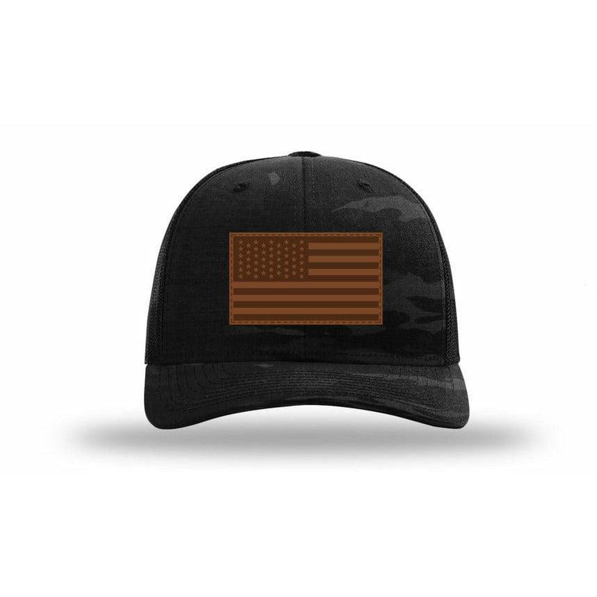 We The Essentials Multicam Black Trucker Hat with Orange Patch